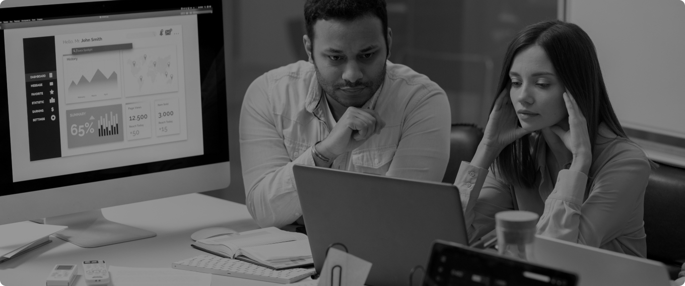 Business analysts reviewing data dashboard and performance metrics for enterprise AI consulting and strategic decision-making